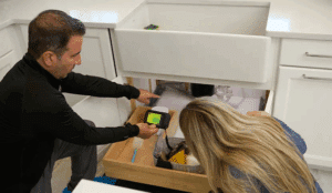 a person and person looking at a device